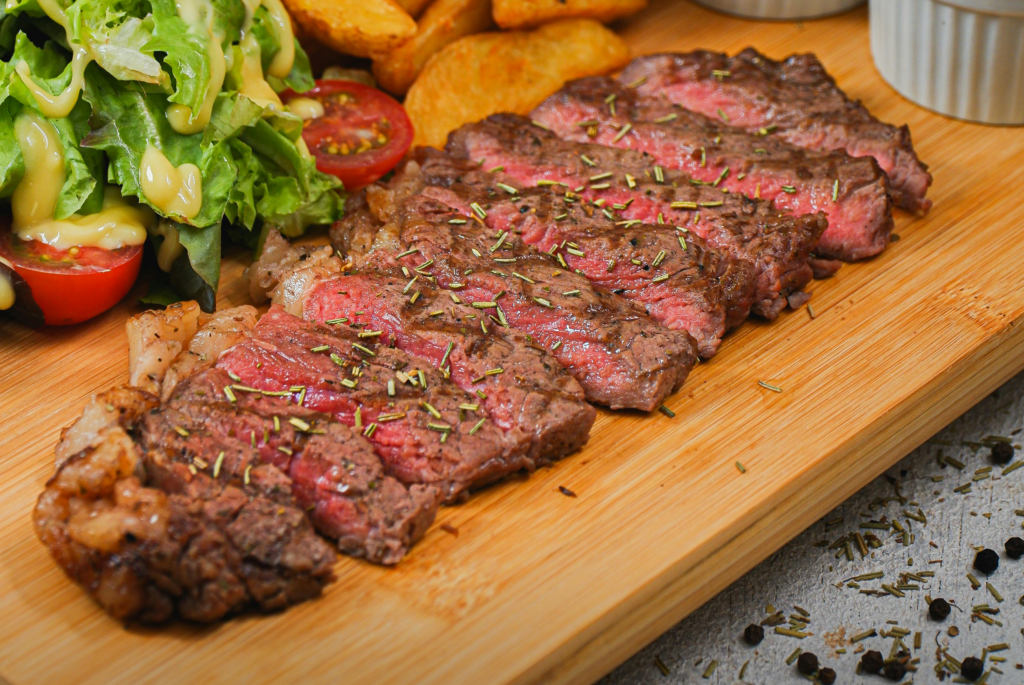 LE RELAIS DE L’ENTRECÔTE offers the iconic French dish steak frites dish that Paris visitors will love