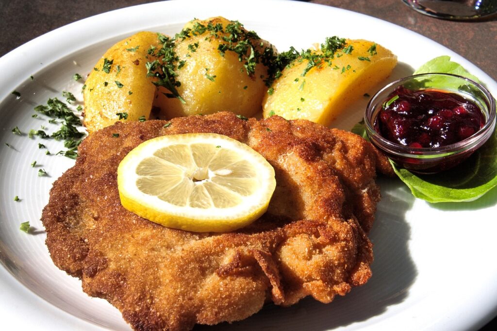 Eat Austrian Delicacies such as Wiener schnitzel, apple strudel, and Sachertorte 